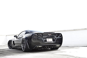 Rear Three-Quarter View of a Black Chevrolet Corvette Z06 Supercharged Sports Car HD wallpaper