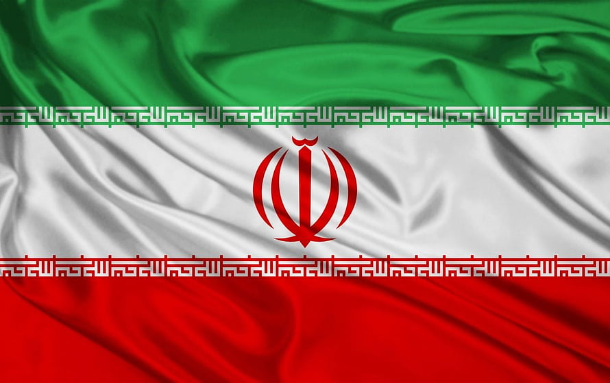 Iran National Flag Waving in Wind with Green White and Red Stripes and Central Emblem HD wallpaper