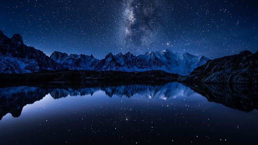 Milky Way Galaxy Reflecting in a Mountain Lake Under a Starry Night Sky HD wallpaper