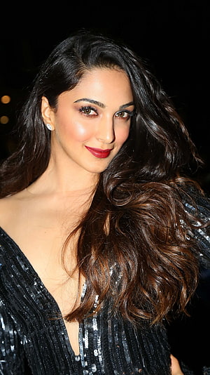 Kiara Advani in a Black Sequined Gown with Long Wavy Hair and Red Lipstick HD phone wallpaper