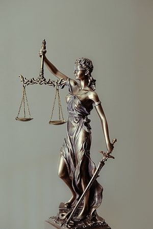 Bronze Lady Justice Statue Holding Scales and Sword on Pedestal HD phone wallpaper