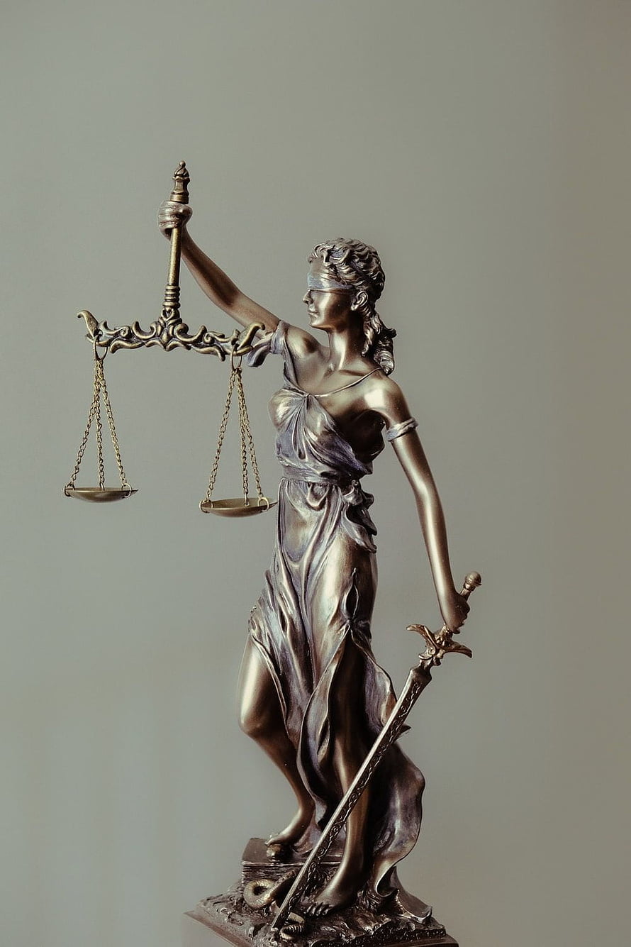 Bronze Lady Justice Statue Holding Scales and Sword on Pedestal HD phone wallpaper