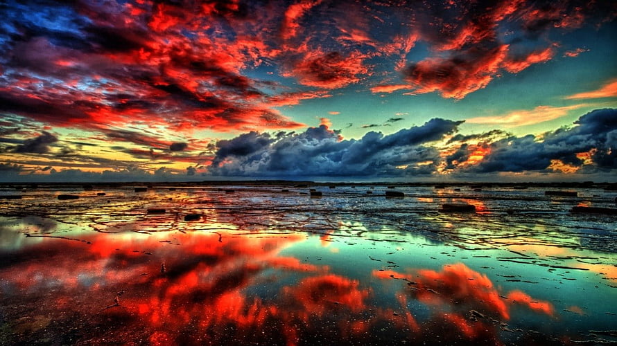Vivid Red Fire Clouds Reflected in Shallow Water at Dramatic Sunset HD wallpaper