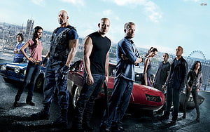 Fast and Furious Cast Standing in Front of Classic Muscle Cars in London HD wallpaper