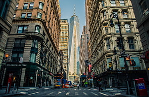 One World Trade Center Rising Above Historic Manhattan Street Architecture HD wallpaper