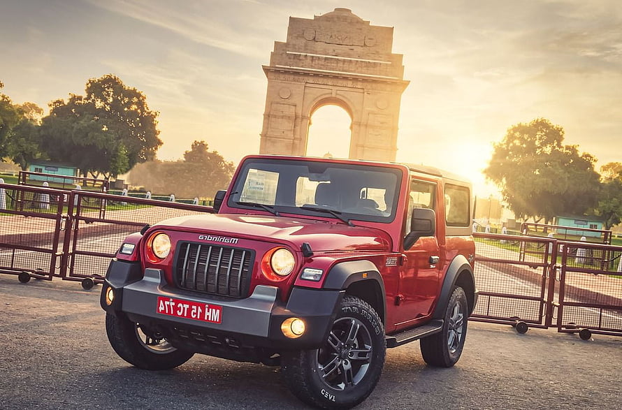 Red Mahindra Thar SUV Parked in Front of India Gate at Golden Hour HD wallpaper