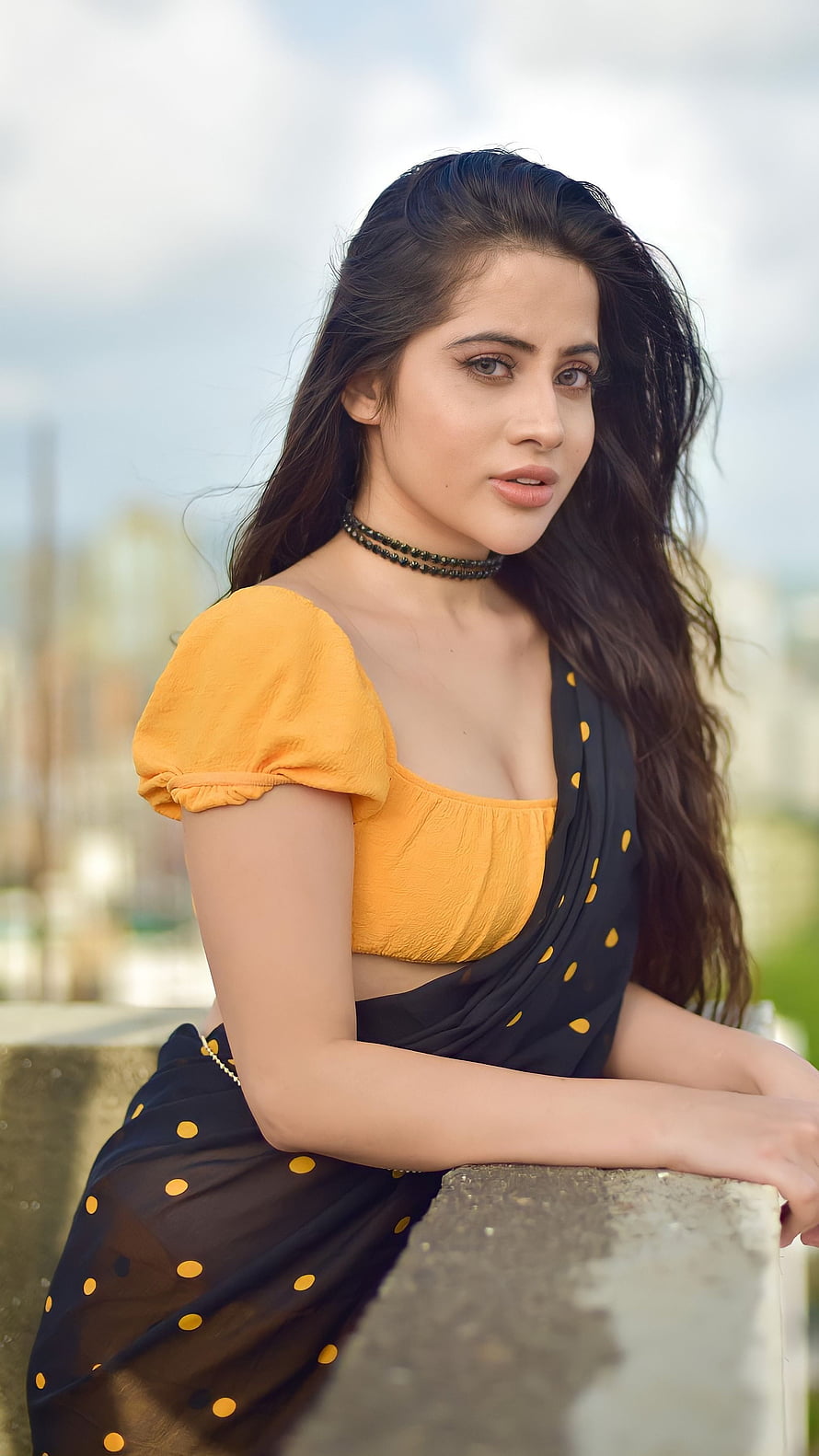 Urfi Javed in a yellow blouse and black polka dot saree with a choker necklace HD phone wallpaper