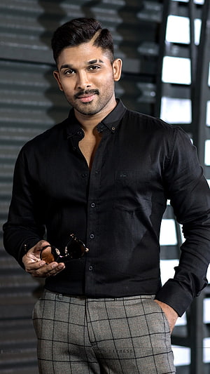 Allu Arjun in Black Shirt and Checkered Trousers Holding Sunglasses HD phone wallpaper