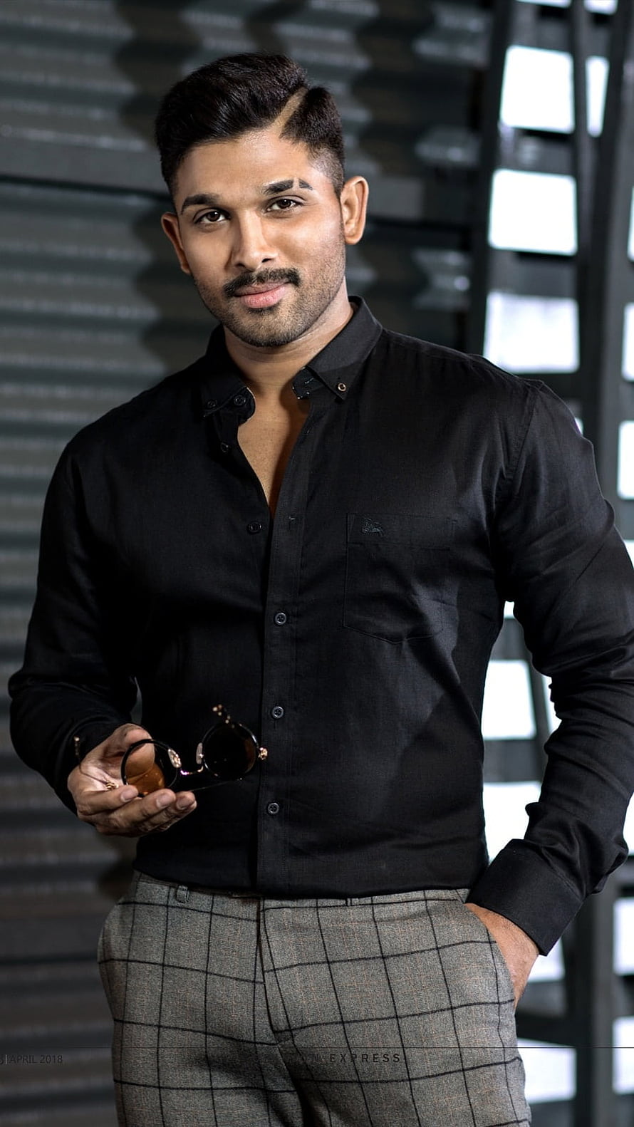 Allu Arjun in Black Shirt and Checkered Trousers Holding Sunglasses HD phone wallpaper
