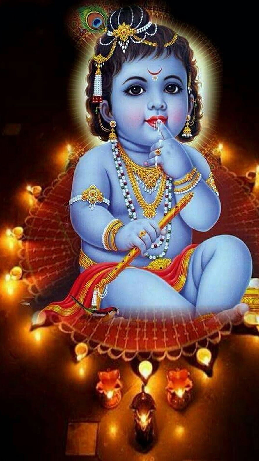Baby Krishna Playing Flute with Diya Lamps and Peacock Feather HD phone wallpaper