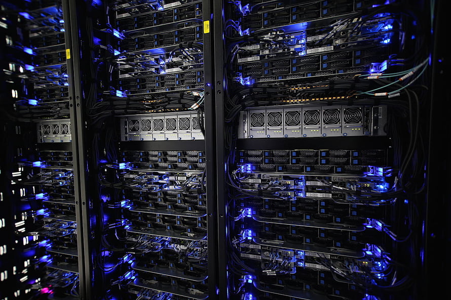 Illuminated Data Center Server Racks with Blue LED Lighting and Dense Cabling HD wallpaper
