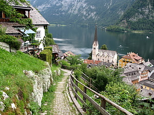 Hallstatt Village and Lake View in the Austrian Alps with Cobblestone Path HD wallpaper
