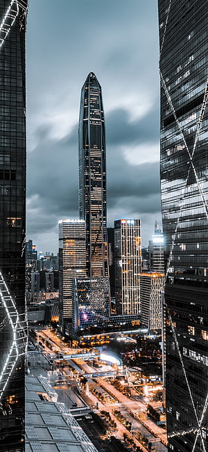 Shenzhen Ping An Financial Center Tower Rising Above Urban Skyline at Dusk HD phone wallpaper