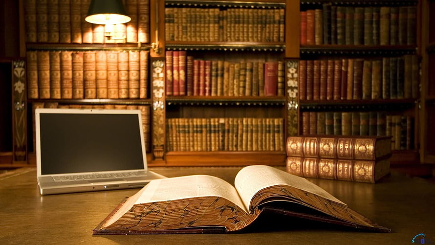 Vintage Law Library with Antique Books and Modern Laptop on Wooden Desk HD wallpaper