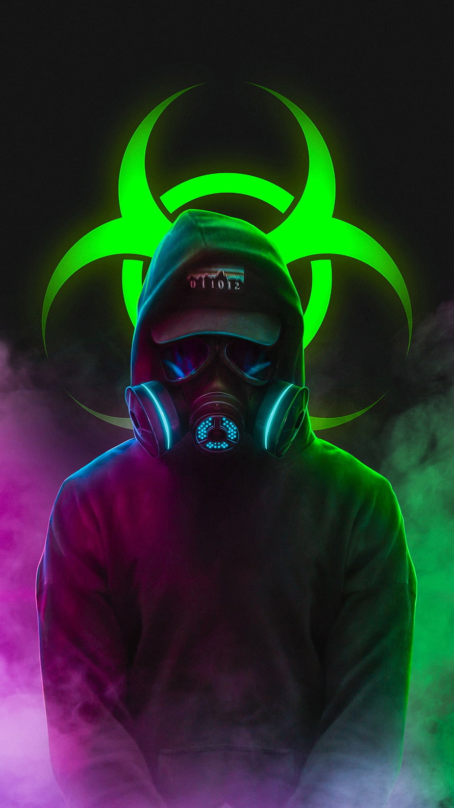 Neon Biohazard Hooded Figure in Gas Mask with Toxic Green and Purple Smoke HD phone wallpaper