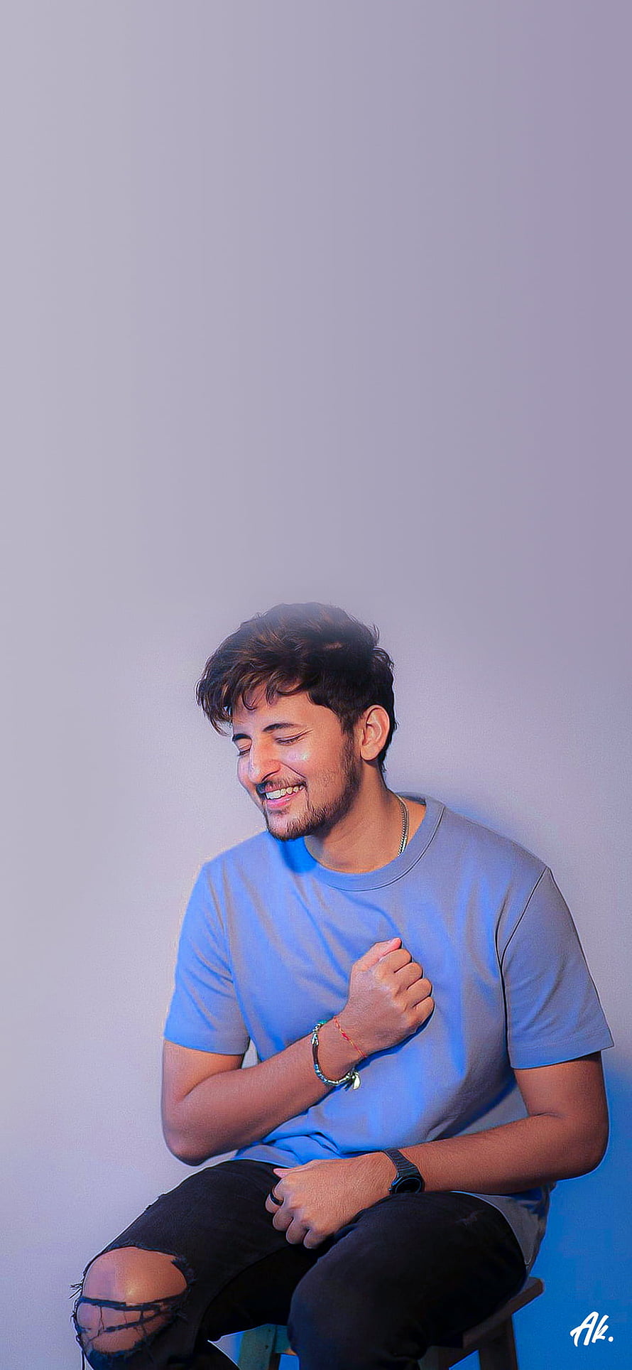 Darshan Raval smiling portrait in blue t-shirt and ripped jeans HD phone wallpaper
