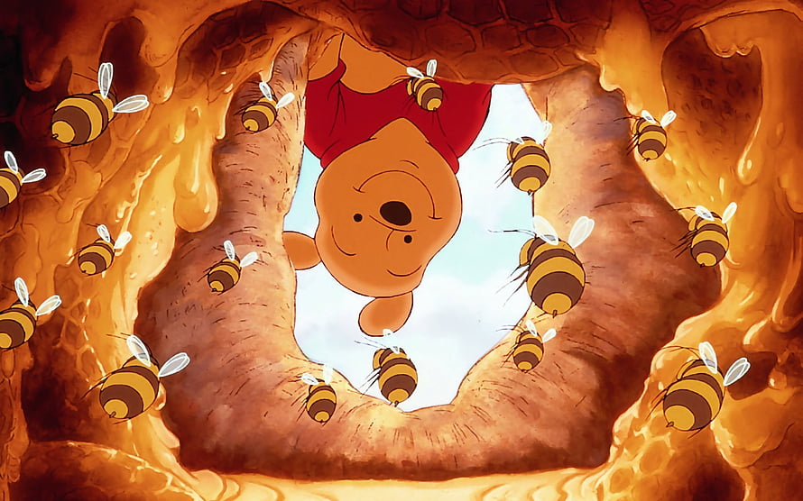 Winnie the Pooh Hanging Upside Down in a Honeycomb Beehive HD wallpaper