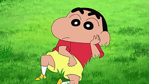 Shin-chan Sitting on Green Grass in Red Shirt and Yellow Shorts Anime Character HD wallpaper