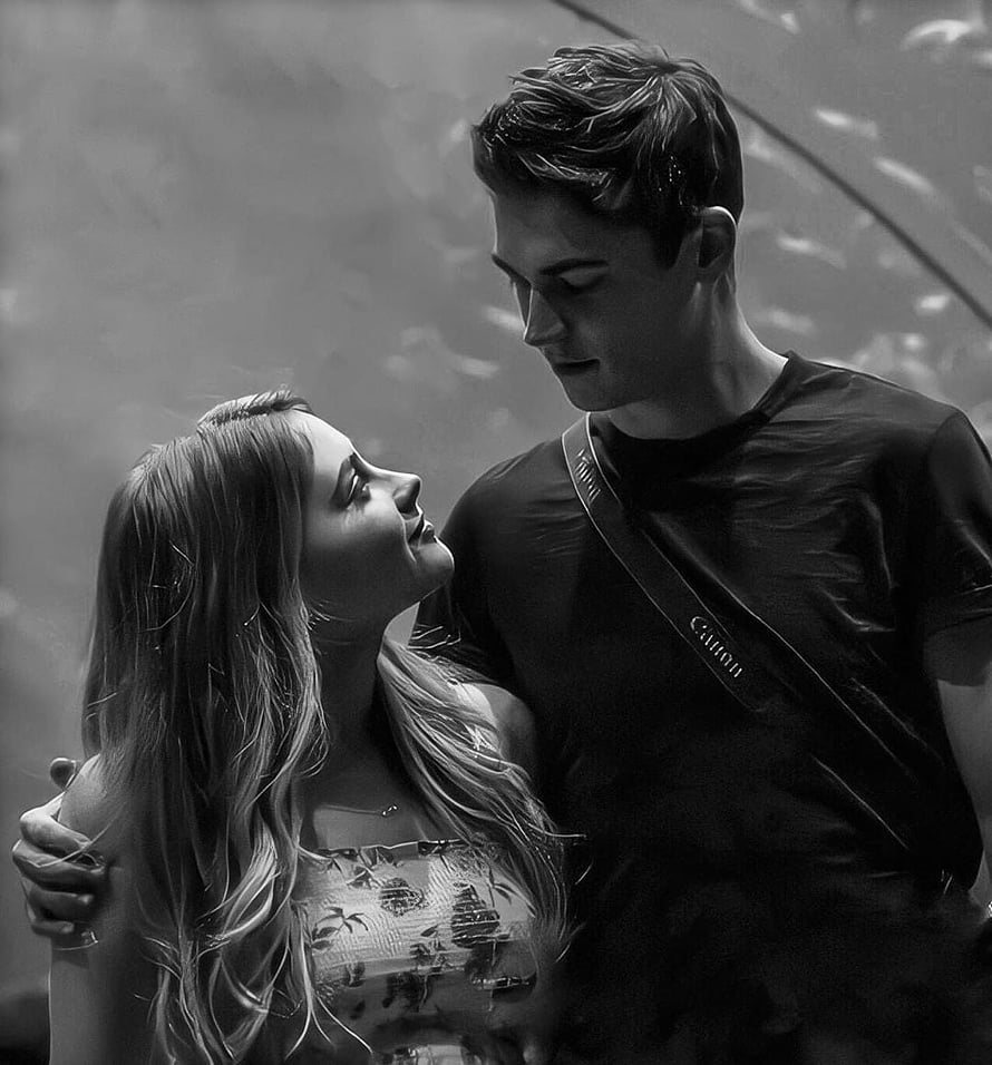Black and White Portrait of a Young Couple Sharing an Intimate Moment HD phone wallpaper