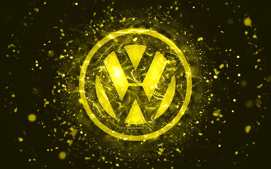 Volkswagen emblem glowing in golden neon light with abstract particle effects on a dark background HD wallpaper