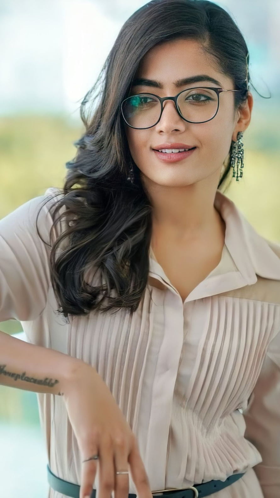 Rashmika Mandanna Portrait in Pleated Blouse and Round Glasses HD phone wallpaper