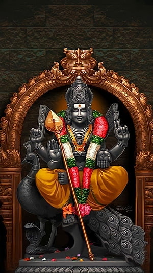 Murugan deity statue with peacock and golden scepter in ornate bronze archway HD phone wallpaper