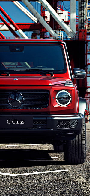 Red Mercedes-Benz G-Class Front View at Industrial Port HD phone wallpaper