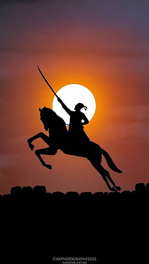 Shivaji Maharaj Silhouette on Horseback with Sword Against Sunset Sky HD phone wallpaper