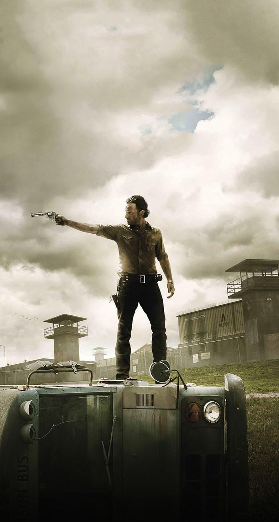 Rick Grimes Standing on Prison Bus Aiming Revolver in The Walking Dead HD phone wallpaper