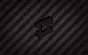 Minimalist YouTube Shorts Logo on Dark Carbon Fiber Texture Background HD wallpaper