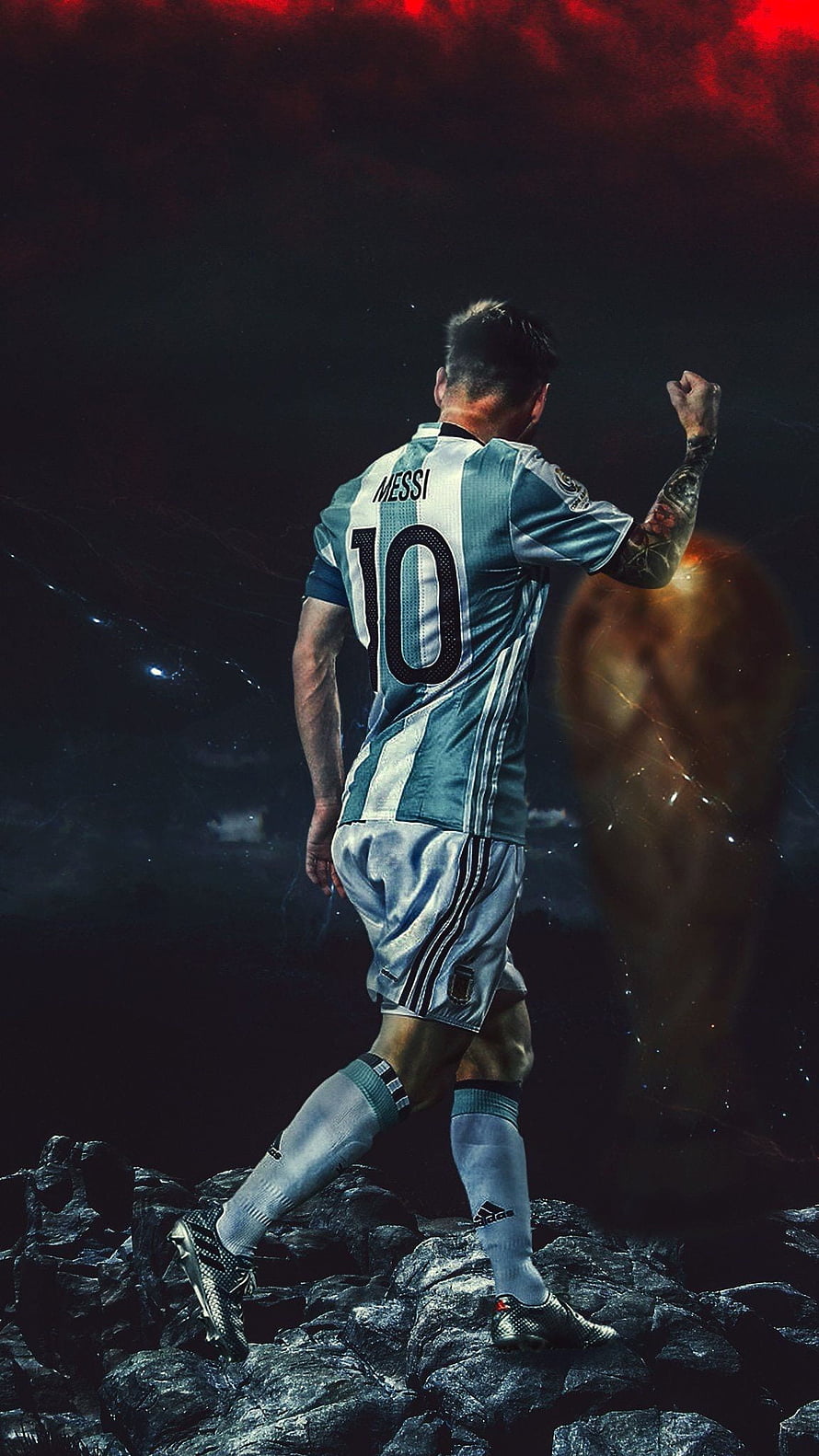 Lionel Messi in Argentina Number 10 Kit Standing on Rugged Rocks with Dramatic Red Sky HD phone wallpaper
