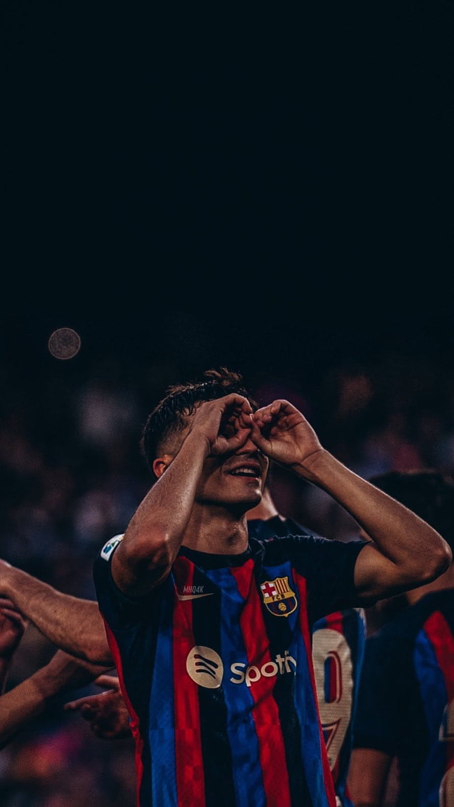 Pedri FC Barcelona Player Celebrating with Hands Over Eyes in Striped Kit HD phone wallpaper