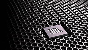 JBL Speaker Grille with Hexagonal Mesh Pattern and Metallic Logo Badge HD wallpaper