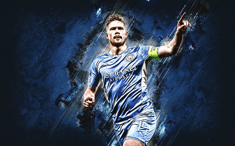Kevin De Bruyne in Manchester City Home Kit Pointing Upward on Dark Blue Background HD wallpaper