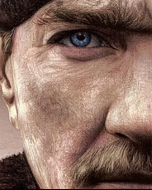 Close-Up Portrait of Mustafa Kemal Atatürk with Intense Blue Eye and Weathered Skin HD phone wallpaper