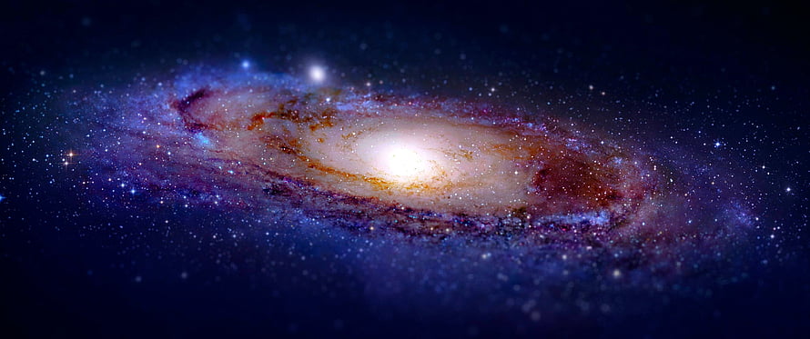 Vibrant Spiral Galaxy with Luminous Core and Dust Lanes in Deep Space HD wallpaper