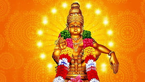 Golden Ayyappa Deity Adorned With Vibrant Flower Garlands Against Radiant Orange Mandala Background HD wallpaper