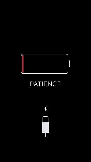 Minimalist Low Battery Charging Screen with Patience Message and Lightning Bolt Icon HD phone wallpaper