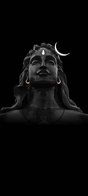 Serene Lord Shiva Statue with Crescent Moon and Third Eye on Black Background HD phone wallpaper
