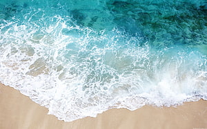 Aerial View of Turquoise Ocean Waves Crashing on Sandy Beach HD wallpaper