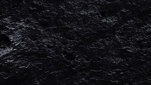Dark Black Stone Texture Surface with Rough Natural Rock Detail HD wallpaper