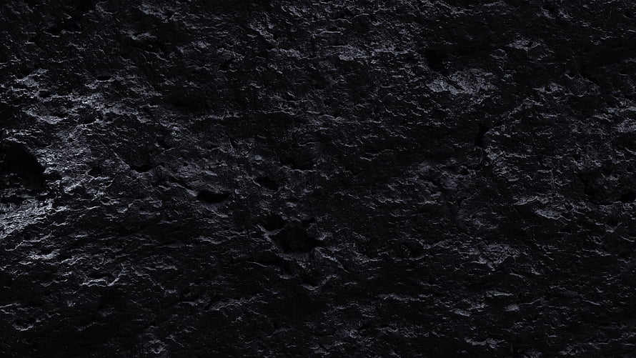 Dark Black Stone Texture Surface with Rough Natural Rock Detail HD wallpaper