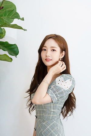 Park Min Young in a Plaid Dress with Lace Detail and Green Foliage HD phone wallpaper