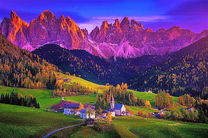 Alpine Village at Twilight with Dramatic Mountain Peaks and Autumn Foliage HD wallpaper