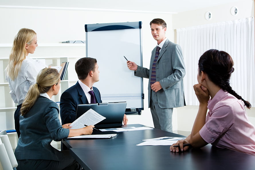 Corporate Team Meeting in Modern Office with Whiteboard Presentation HD wallpaper