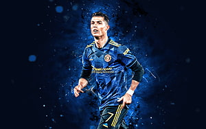 Cristiano Ronaldo in Manchester United Blue Kit with Dynamic Neon Splash Effect HD wallpaper