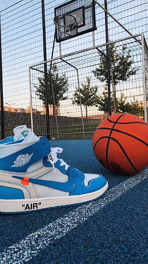 Off-White x Air Jordan 1 High in Blue and White on an Outdoor Basketball Court HD phone wallpaper