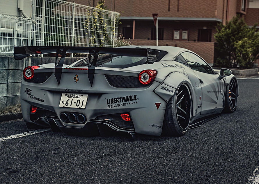 Rear View of a Modified Grey Ferrari 458 with Liberty Walk Widebody Kit and Large Rear Wing HD wallpaper