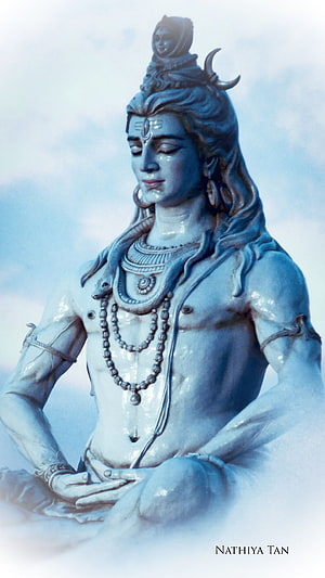 Serene Shiva Statue in Meditation with Serpent and Crescent Moon Adornments HD phone wallpaper