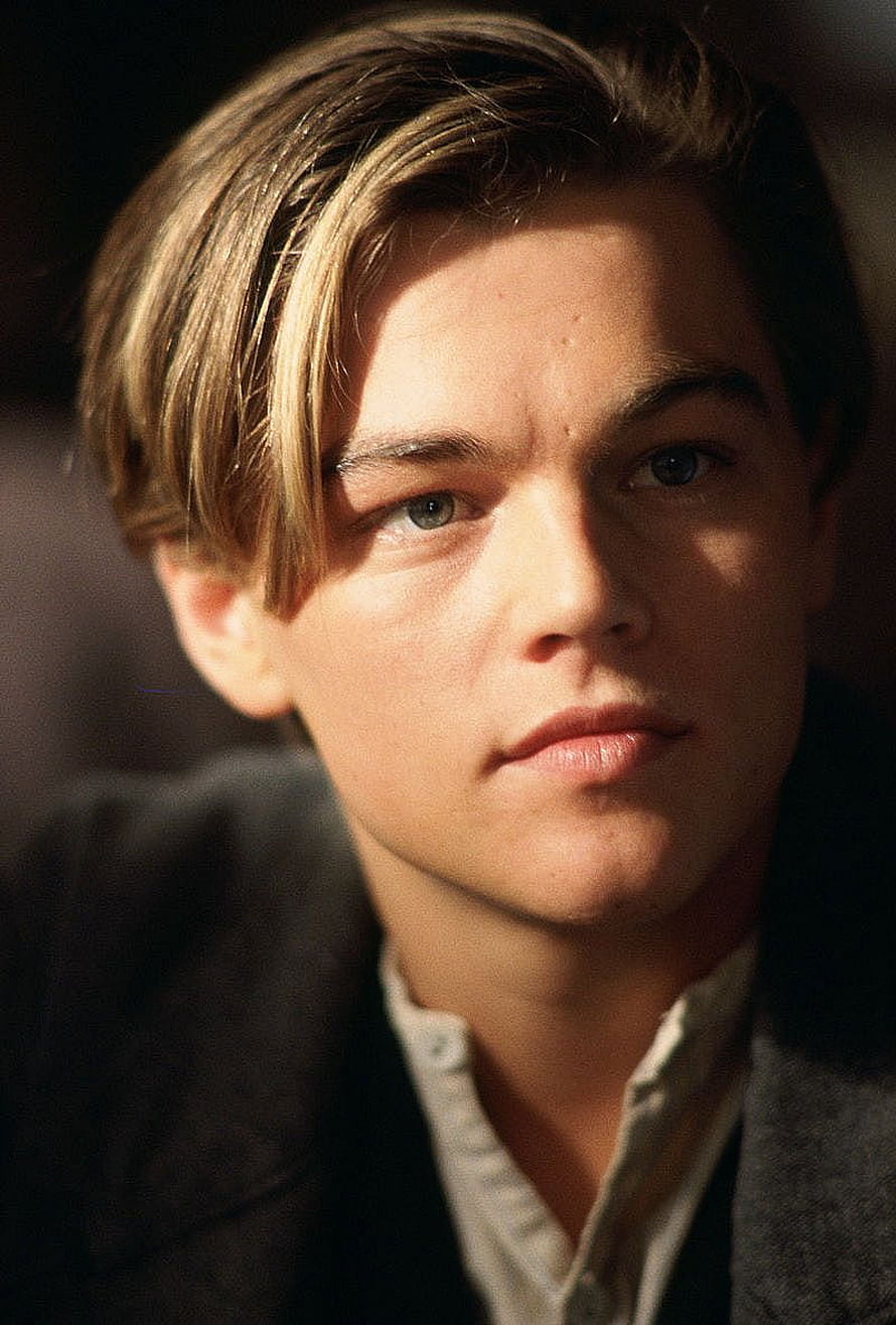 Leonardo DiCaprio in Titanic: Classic 1990s Portrait with Warm Cinematic Lighting HD phone wallpaper